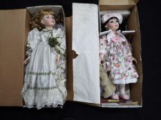 Alberon - Two boxed porcelain collectors dolls by Alberon.