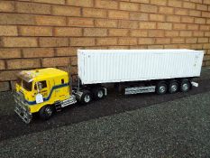 Tamiya - 1/14 R/C globe-liner truck with container trailer and container.Tamiya - .