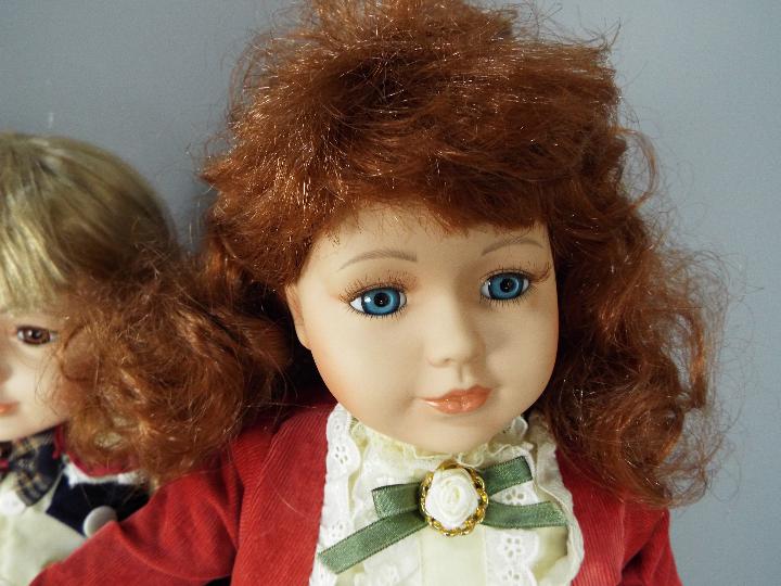 4 Collectable painted dolls with glass eyes (3 on stands). - Image 7 of 7