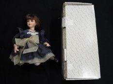 Alberon - A limited edition, porcelain, dressed doll by Alberon,