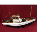 A scratch built model constructed in wood and plastic of a fishing vessel.