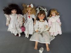 Alberon - 3 Collectable, dressed hand painted dolls with glass eyes approximately 35-45 cm .