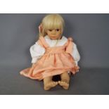 Gotz - A vinyl dressed doll by Gotz, marked to the back of the neck Gotz 486-20,