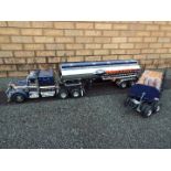 Tamiya - 1/14 R/C Grand hauler truck model with Gallant EAGLE fuel tanker and flatbed trailer.
