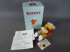 Steiff - A boxed limited edition Steiff Rupert The Bear ornament # 653537, white tag,