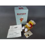 Steiff - A boxed limited edition Steiff Rupert The Bear ornament # 653537, white tag,