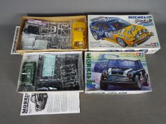 Tamiya - Two boxed 1:24 scale plastic model car kits by Tamiya.