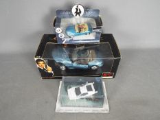 UT Models, Corgi, Eaglemoss - Three boxed diecast 'James Bond' diecast vehicles.