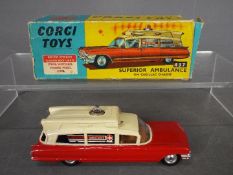 Corgi Toys - A boxed Corgi #437 Superior Ambulance in cream over red body with clear battery