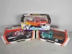 Road Signature, Muscle Machines - Three boxed 1:18 scale diecast model cars.