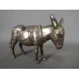 A cast metal money bank in the form of a donkey, marked 'A.S.C.