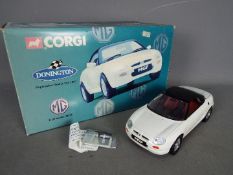 Corgi - Boxed 1:18 scale Corgi MGF model complete with it's mirrors and aerial still in the box