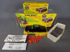 Corgi Toys - A boxed Corgi Toys #268 The Green Hornet 'Black Beauty'.