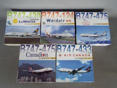 Dragon Wings - Five boxed diecast 1:400 scale model Boeing 747 aircraft in various carrier liveries