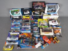 Maisto - Hot Wheels - Others. Collection of 30 mostly boxed diecast vehicles in various scales.