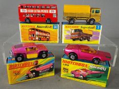 Matchbox Superfast - Four boxed Matchbox Superfast diecast vehicles.