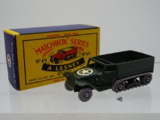 Matchbox - A boxed Matchbox #49 Army Half Track MkIII (M3 Personel Carrier) The model in green with