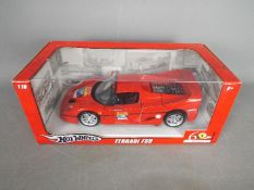 Hot Wheels - A boxed 1:18 scale Hot Wheels L2963 Ferrari '60 Relay' F50.