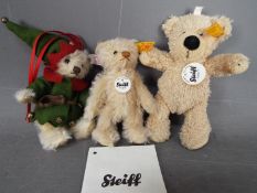 Steiff - three Steiff Bears to include Santa's Elf #038729,