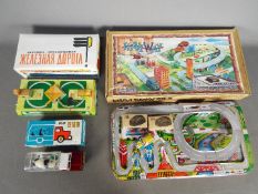 Tinplate Toys - Three boxed tinplate toys.