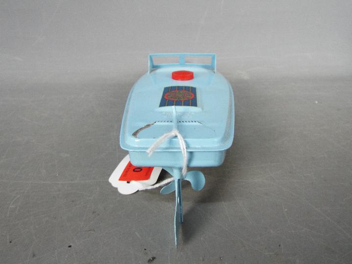 Sutcliffe Models - An unboxed tinplate clockwork Sutcliffe Comet Speedboat. - Image 5 of 6