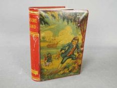 A Chad Valley novelty tinplate money box in the form of a book,