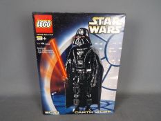 Lego - Boxed Star Wars 8010 Darth Vader model. The box is factory sealed with minor storage marks.