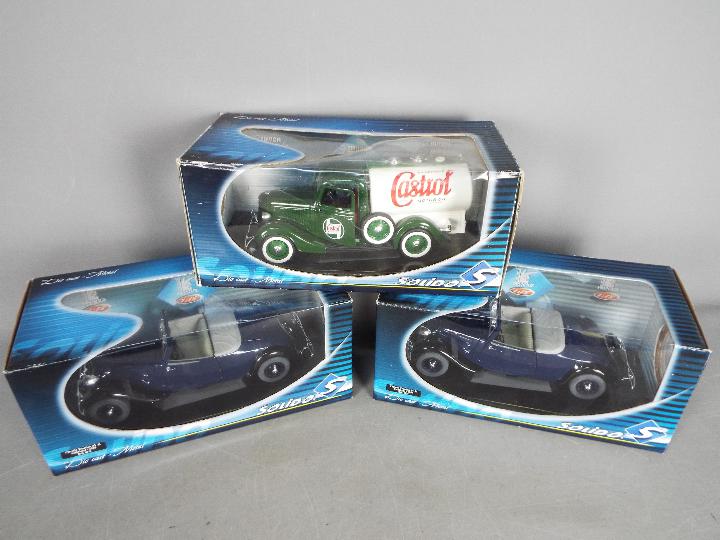 Solido - Three boxed 1:18 scale diecast model cars from Solido.
