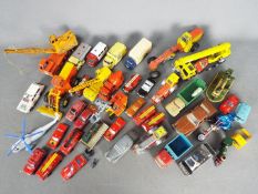 Dinky - Corgi - Matchbox. Collection of over 30 loose diecast vehicles in various scales.