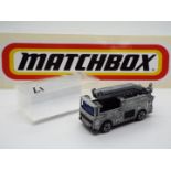 Matchbox - A 'First Shot' model of a Matchbox #63 Merryweather Snorkel Fire Truck.