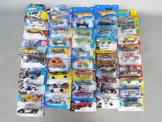 Hot Wheels - A collection of 41 carded modern Hot Wheels models.