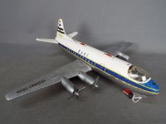 Schuco - An unboxed Schuco vintage battery powered tinplate model BOAC Radiant 5600 aircraft.