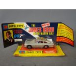 Corgi Toys - A RARE boxed Corgi Toys #270 James Bond Aston Martin DB5 in a pictorial wing flap