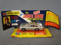 Corgi Toys - A RARE boxed Corgi Toys #270 James Bond Aston Martin DB5 in a pictorial wing flap