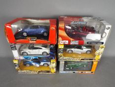 Maisto, Bburago,Welly - Six boxed diecast model cars in 1:24 scale.