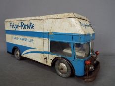 Joustra - An unboxed tinplate clockwork removal van 'Frige-Route'.