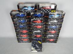 Onyx - A collection of 21 boxed 1:43 scale diecast F1 racing cars by Onyx.