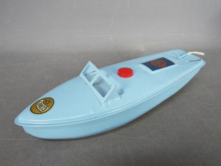 Sutcliffe Models - An unboxed tinplate clockwork Sutcliffe Comet Speedboat.
