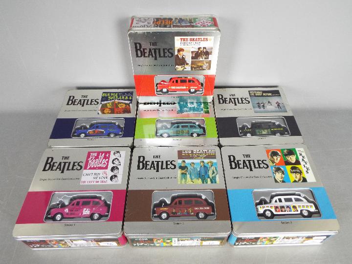 The Beatles - Seven 'The Beatles Single Sleeve Die Cast Collectable Tins' .
