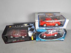 Welly, Solido, Shell Classico - Three boxed 1:18 scale diecast model cars.