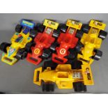 Corgi - 5 Corgi Carry Case Grand Prix Cars showing signs of light play,