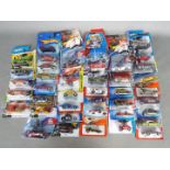 Hot Wheels - A collection of 40 carded modern Hot Wheels models.