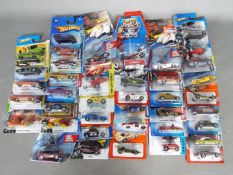 Hot Wheels - A collection of 40 carded modern Hot Wheels models.