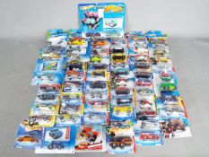 Hot Wheels - Collection of over 50 unopened Hot Wheels vehicles.