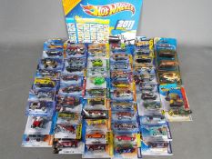 Hot Wheels - Matchbox. Collection of over 50 unopened diecast vehicles mostly Hot Wheels.
