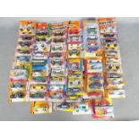 Matchbox - A collection of 53 carded modern Matchbox vehicles.