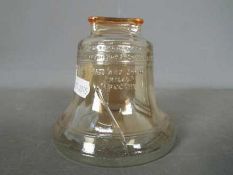 A vintage, Anchor Hocking, carnival glass, money bank in the form of the Liberty Bell,