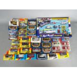 Matchbox - A collection of over 30 boxed/carded Matchbox models from the 1980s and 90s including