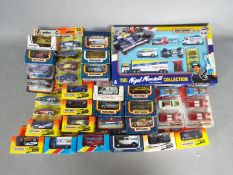 Matchbox - A collection of over 30 boxed/carded Matchbox models from the 1980s and 90s including