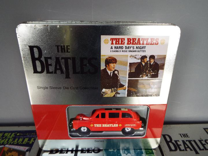 The Beatles - Seven 'The Beatles Single Sleeve Die Cast Collectable Tins' . - Image 2 of 3